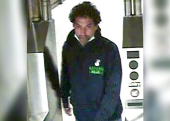 The Queens subway attacker is shown leaving the Queens Plaza station.