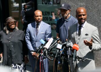 Jordan Neely's family and their attorneys speaking at a news conference