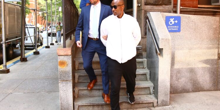 Christopher Neely, Jordan Neely's uncle, was walked out of the 19th Precinct in Manhattan on May 31.