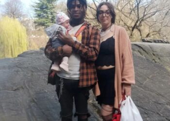 Damion Comager, 23, and Ivana Paolozzi, 20, seen in an Instagram photo with slain infant daughter Genevieve Comager.