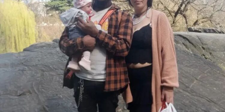 Damion Comager, 23, and Ivana Paolozzi, 20, seen in an Instagram photo with slain infant daughter Genevieve Comager.