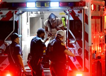 EMS arrives to transport the victims of the Saturday night shooting on Drew Street near Stanley Avenue in East New York.
