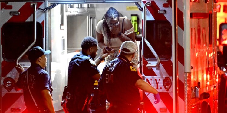 EMS arrives to transport the victims of the Saturday night shooting on Drew Street near Stanley Avenue in East New York.