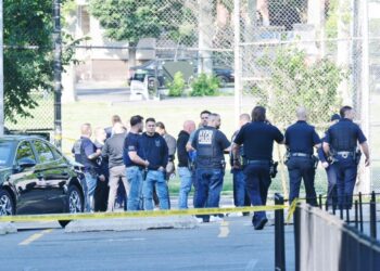 Cops gather at crime scene