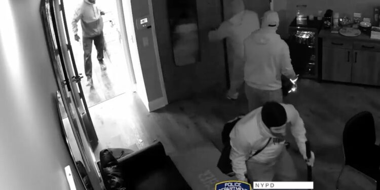 The suspects are seen entering a room inside The Wrist Watcher on Arthur Kill Road near South Bridge Street.