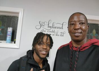 Jordan Williams with  his father, James.