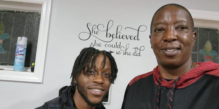 Jordan Williams with  his father, James.