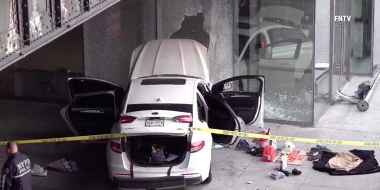 pictured is the scene on West 15th Street near 10th Avenue, where Bitton allegedly crashed into a building.