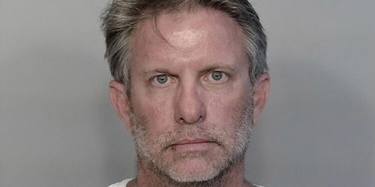 Lloyd Brewer III, right, is charged with fatally shooting 21-year-old Garrett Hughes outside a Key West bar.