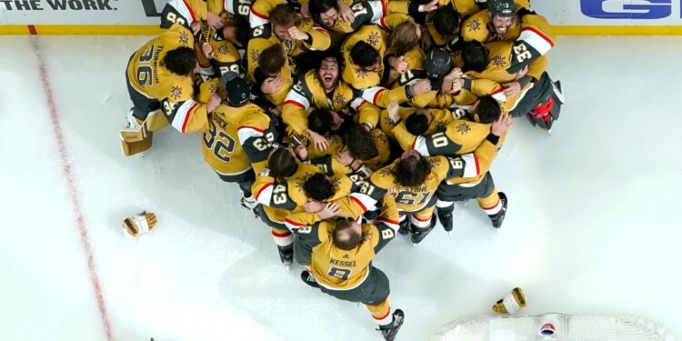 Members of the Vegas Golden Knights celebrate after they defeated the Florida Panthers 9-3 to win the Stanley Cup in Game 5 of the NHL hockey Stanley Cup Finals Tuesday, June 13, 2023