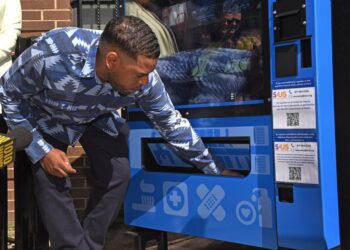 NYC Health Commissioner Ashwin Vasan introduced a pilot program to place vending machines containing harm reduction materials at the corner of Decatur Street and Broadway in Bushwick earlier today.  Naloxone (for heroin drug overdoses) is one of the products that people can get, as well as nicotine gum and condoms.  The machine will be maintained by a non profit called Services for the Underserved.