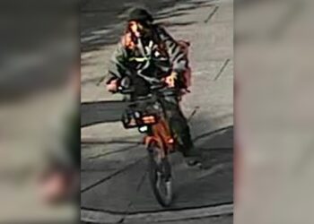 A surveillance image released by the NYPD of the suspected hit-and-run cyclist.