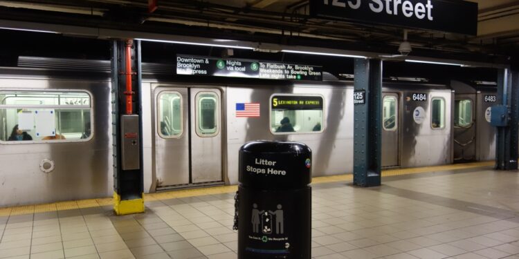 A Brooklyn-bound 5 train at the 125th Street IRT Lexington Avenue station in East Harlem, Manhattan.