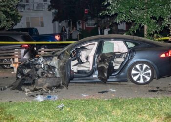 The smashed-up Tesla seen at the scene of the crash at Ocean Parkway and Avenue M.