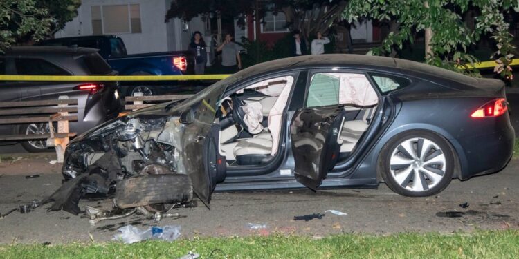 The smashed-up Tesla seen at the scene of the crash at Ocean Parkway and Avenue M.