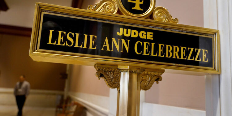 A black and gold plaque reads: “Judge Leslie Ann Celebrezze”.
