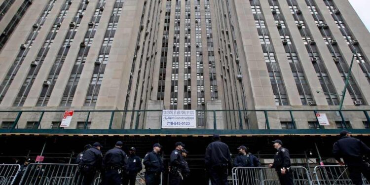 New York police officers provide security outside the Manhattan District Attorney's office in New York City on April 3, 2023.