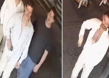 A surveillance image of the three suspects in the Pride flag vandalism.