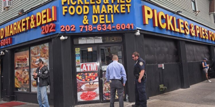 Two workers at a deli in Rockaway Park, Queens were arrested for allegedly attacking a drunk man who entered their store.