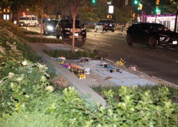 An SUV crashed at the scene of the shooting  on Morris Avenue near East 182nd Street in Fordham Heights.