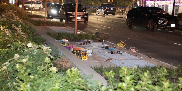 An SUV crashed at the scene of the shooting  on Morris Avenue near East 182nd Street in Fordham Heights.