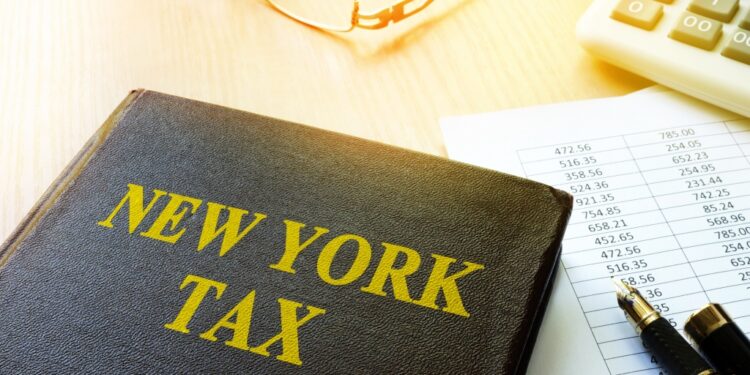 Book with title New York tax and calculator.