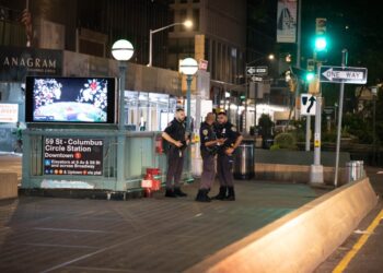 Police are seen at the entrance to the subway at 59 St. and Columbus Circle in Manhattan Monday, July 17, 2023, where a person was robbed of their cell phone and assaulted on the 1 train.