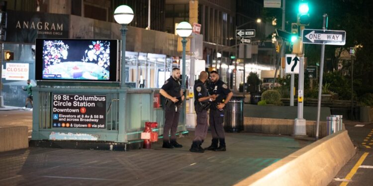 Police are seen at the entrance to the subway at 59 St. and Columbus Circle in Manhattan Monday, July 17, 2023, where a person was robbed of their cell phone and assaulted on the 1 train.