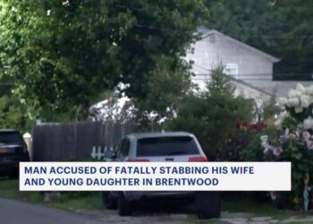 Police at a scene of a fatal double stabbing in Brentwood, New York, Sunday.