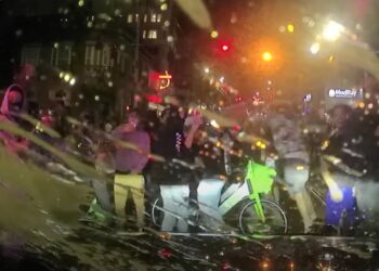 Crowd in Seattle gathering at an illegal event.