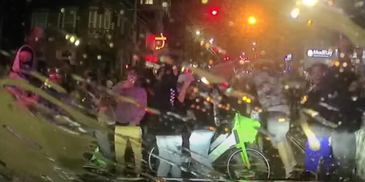 Crowd in Seattle gathering at an illegal event.