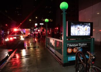 Emergency vehicles are seen at the 7th Ave. and 53 St. subway station.