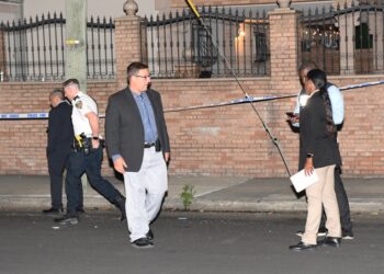 The scene outside 1402 East 70th Street, where a teen girl was shot late Tuesday.