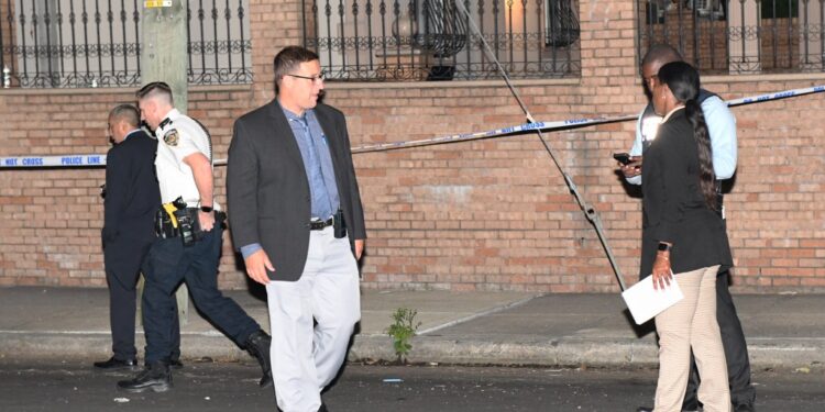 The scene outside 1402 East 70th Street, where a teen girl was shot late Tuesday.