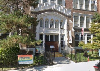 A photo of P.S. 97 - The Forest Park School, where Jamal Russell worked.-