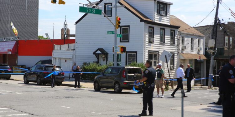 Police at the scene of where an off-duty NYPD cop was shot in Queens on August 30, 2023.