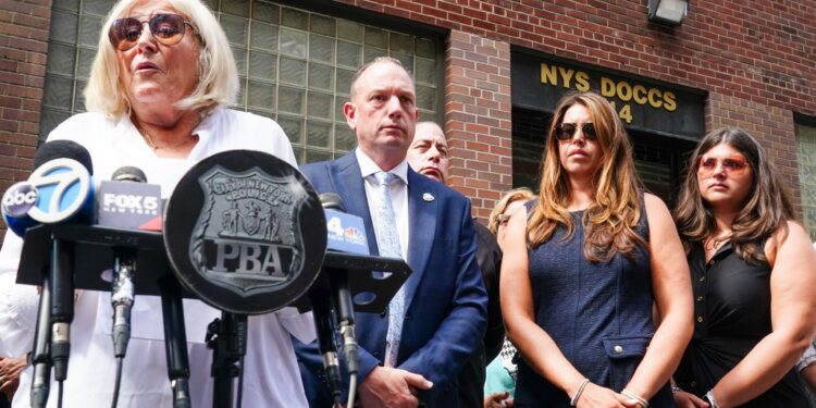 Mary Beth O'Neill, widow of slain NYP Police Officer Thomas Ruotolo and NYC PBA President Patrick Henry speak.