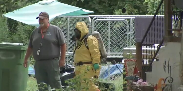 Police had to open up the windows and doors to air out the noxious home before authorities entered, police said.