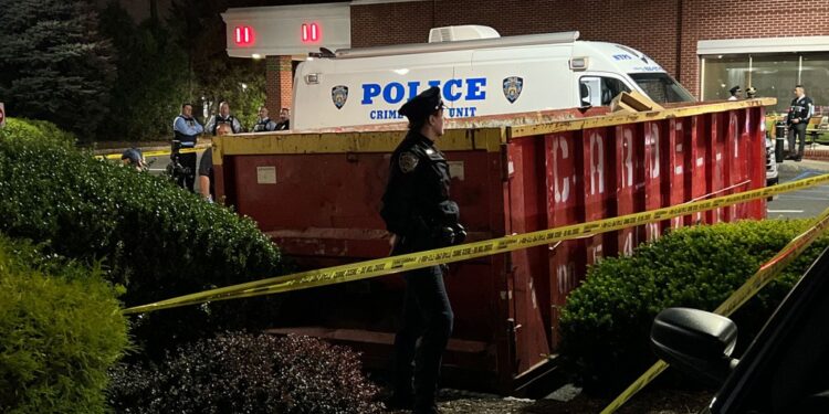 A human leg was discovered protruding from a recycling bin in the Hillcrest neighborhood of Queens.