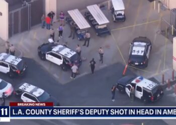 Deputy Clinkunboomer's car rolled forward following being shot. Police have opened an Investigation into the random killing.