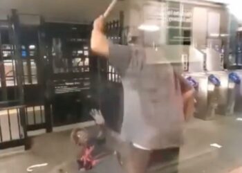 Disturbing video captures the moment a man viciously beat a woman with a cane.