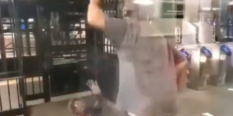 Disturbing video captures the moment a man viciously beat a woman with a cane.