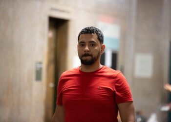 Christopher Aquillon allegedly punched his 33-year-old wife in the face as she held her 2-year-old son, while demanding her cell phone inside the shelter.