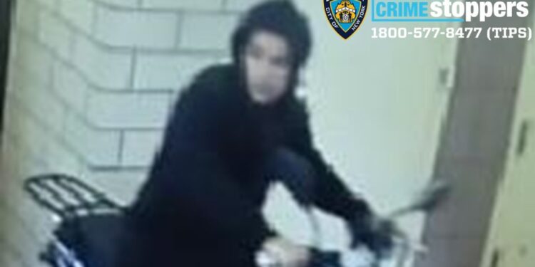 The suspect in the series of stick-ups is shown wearing a black hoodie and riding a scooter.