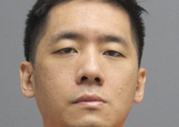 Rui Jiang, 35, is charged with threats of bodily harm and carrying a dangerous weapon to a place of religious worship.
