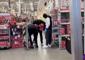 Three of the thieves loading up on power tools on Home Depot.
