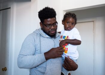 Jose Lino and his two year old son Jaziel Lino, stand in their apartment after little Lino returned from the hospital. Lino was one of the children exposed to fentanyl in a daycare in the Bronx that was a front for a drug dealing operation. A one year old died from a fentanyl OD.