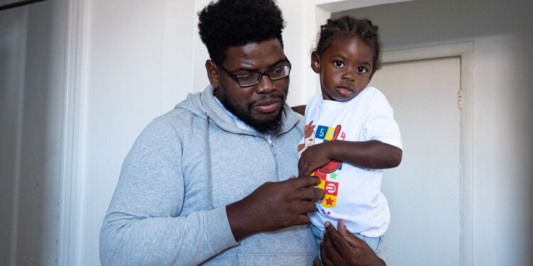 Jose Lino and his two year old son Jaziel Lino, stand in their apartment after little Lino returned from the hospital. Lino was one of the children exposed to fentanyl in a daycare in the Bronx that was a front for a drug dealing operation. A one year old died from a fentanyl OD.