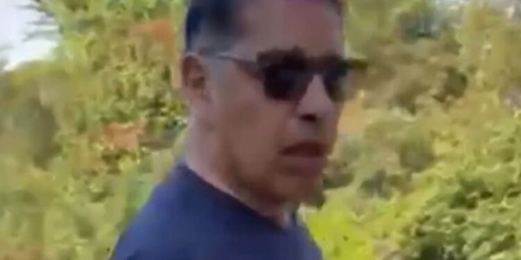 The suspect in the baton assault in Central Park, seen in a grab from surveillance footage, taken by the victim's daughter.