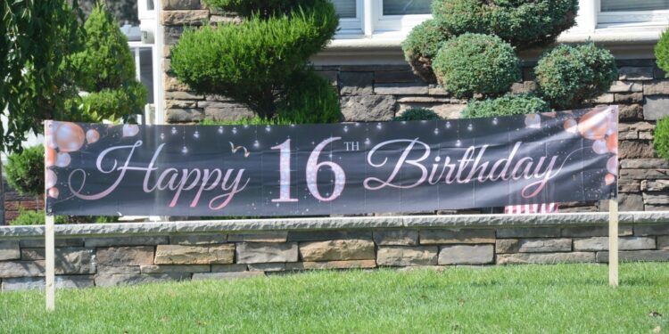 A "Happy 16th Birthday" banner was on display in the shooting victim's yard on Pompey Avenue near Wilson Avenue in Eltingville.